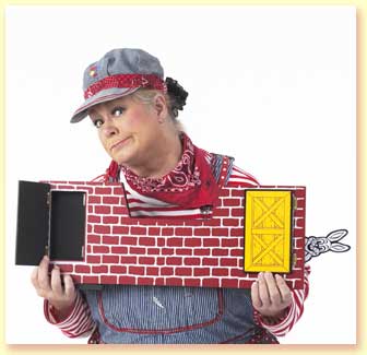 Picture of Engineer Maggie, a character for the 2010 Summer Reading program for the Texas library association, holding the star of the show, a white bunny.