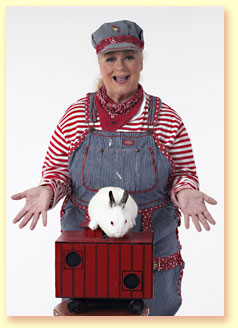 Picture of Engineer Maggie, a character for the 2010 Summer Reading program for the Texas library association, with the star of the show, a white bunny.