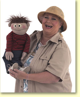 Picture of Margaret Clauder, puppeteer, with Elmer, a hand puppet.